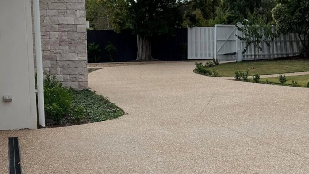 Concrete driveways Melbourne exposed aggregate curved residential driveway