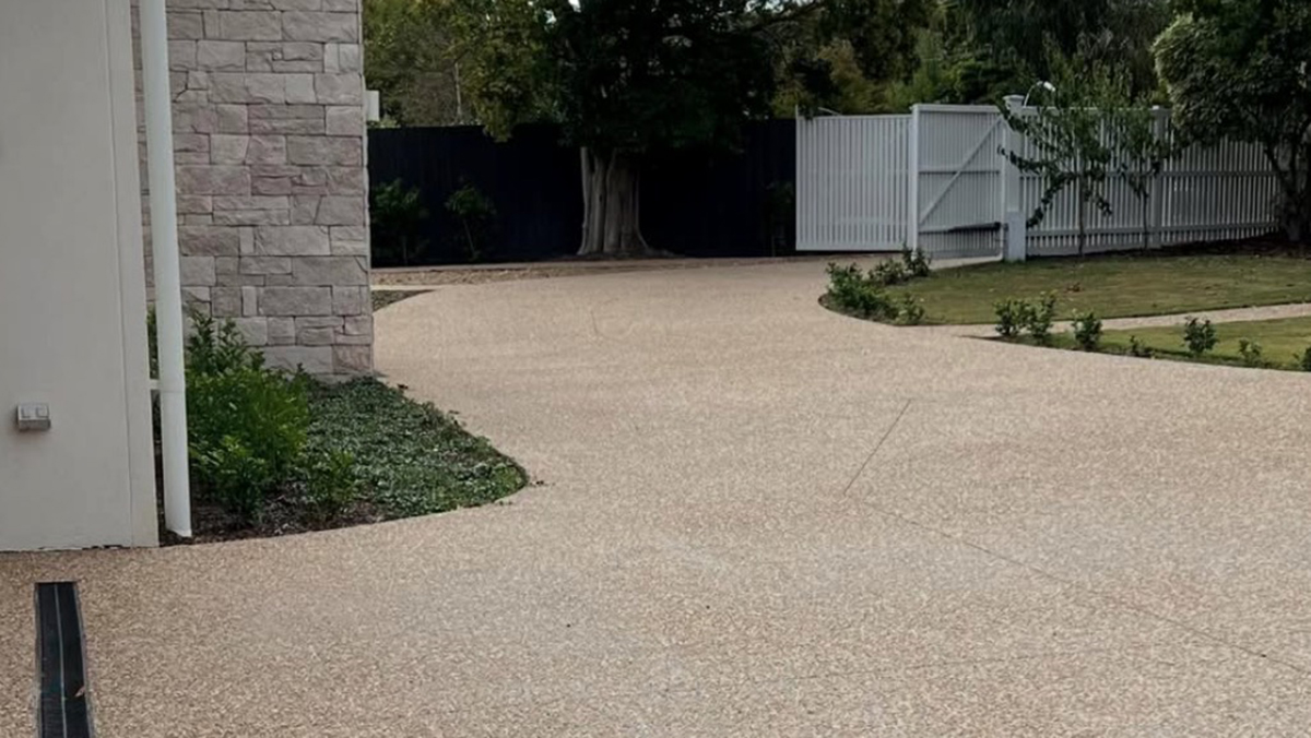 Concrete driveways Melbourne exposed aggregate curved residential driveway